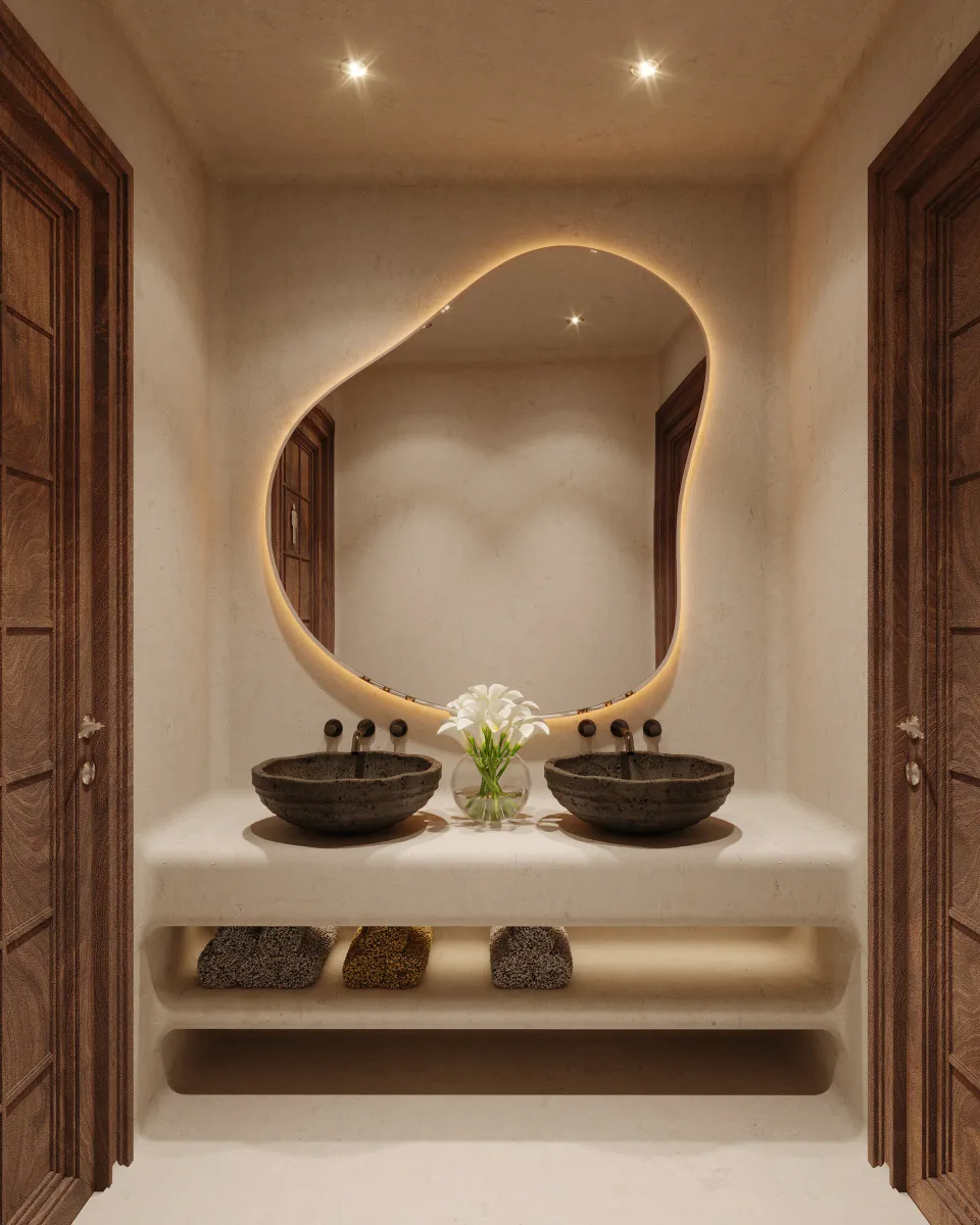 Rodha Farm washroom vanity with twin stone basins under a sculpted mirror